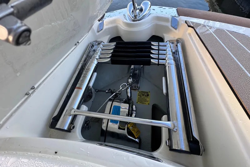  Yacht Photos Pics 2021 Chris-Craft Launch 31 GT engine compartment with hydraulic components and anchor storage.