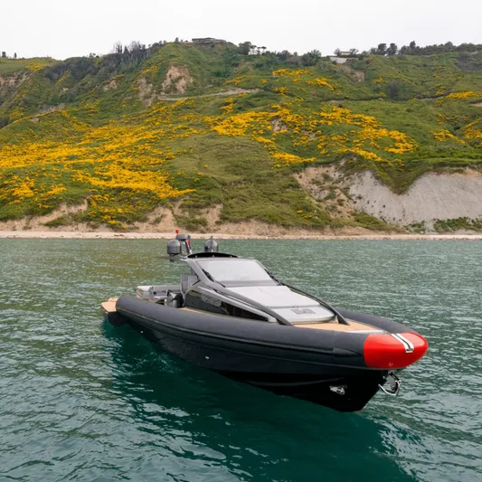 Anvera 58 Yacht Photos Pics Anvera ANVERA 58 yacht, 2025 model, on serene water with lush hillside backdrop.