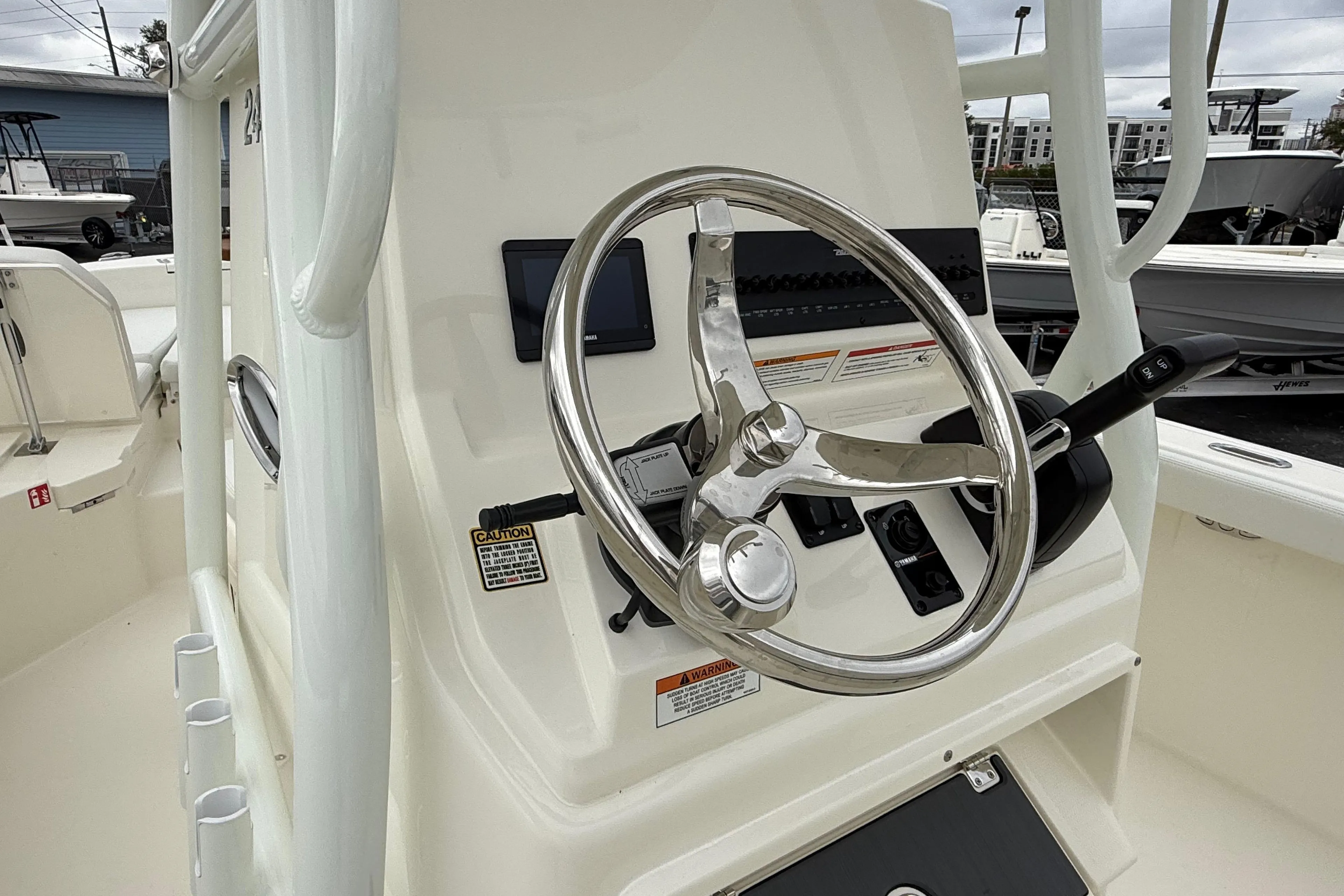 Steering console of 2026 Pathfinder 2400 TRS boat with modern controls.