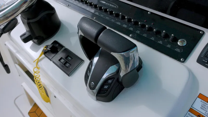  Yacht Photos Pics Close-up of 2022 Cobia 350 Center Console boat controls and throttle.