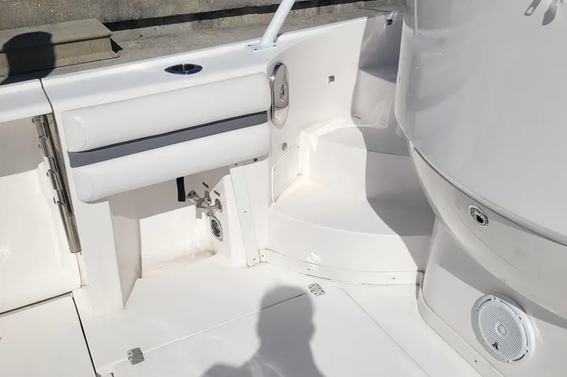  Yacht Photos Pics 2016 Intrepid 475 Sport Yacht interior with white seating and speaker.