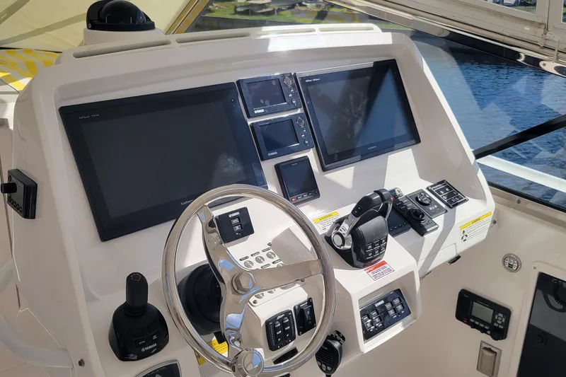  Yacht Photos Pics Control panel of a 2016 Intrepid 475 Sport Yacht with advanced navigation systems.
