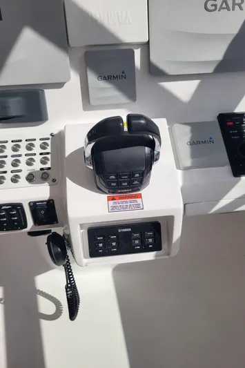  Yacht Photos Pics Control panel of 2016 Intrepid 475 Sport Yacht with Garmin and Yamaha equipment.