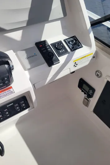  Yacht Photos Pics Control panel of a 2016 Intrepid 475 Sport Yacht with Garmin navigation system.