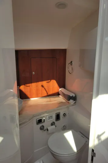  Yacht Photos Pics 2016 Intrepid 475 Sport Yacht bathroom with modern fixtures and wooden accents.