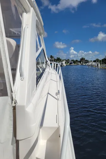  Yacht Photos Pics Intrepid 475 Sport Yacht 2016 on calm water under clear blue sky.