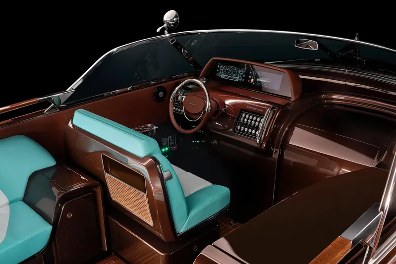 Bacio Yacht Photos Pics Interior of 2023 Riva Anniversario boat with elegant wood and turquoise seating.