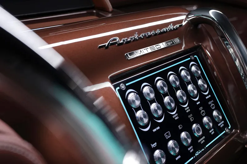 Bacio Yacht Photos Pics 2023 Riva Anniversario dashboard with digital controls and limited edition badge.