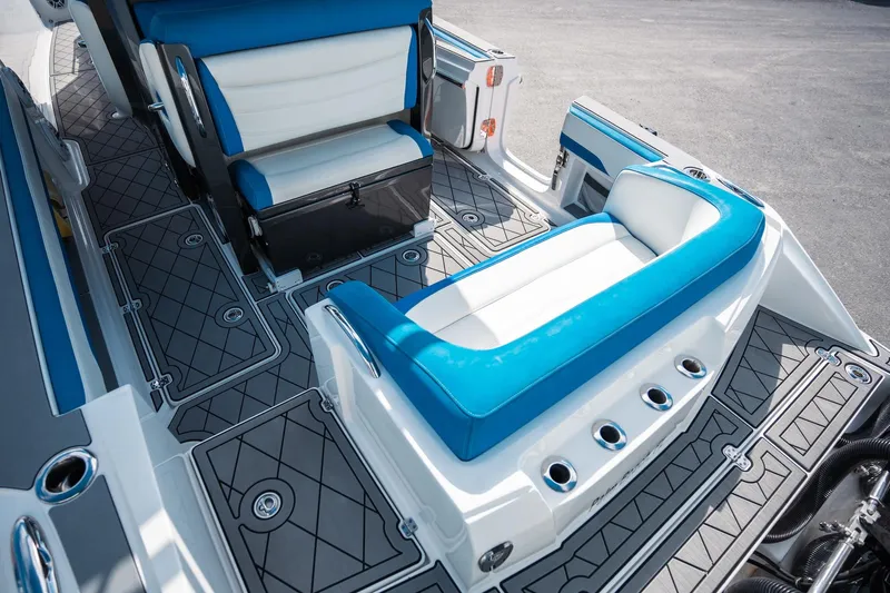  Yacht Photos Pics 2017 Nor-Tech 390 Sport Center Console with blue and white seating, stylish deck design.