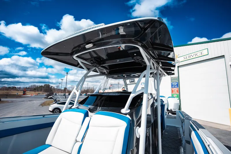  Yacht Photos Pics 2017 Nor-Tech 390 Sport Center Console boat with sleek design and blue accents.