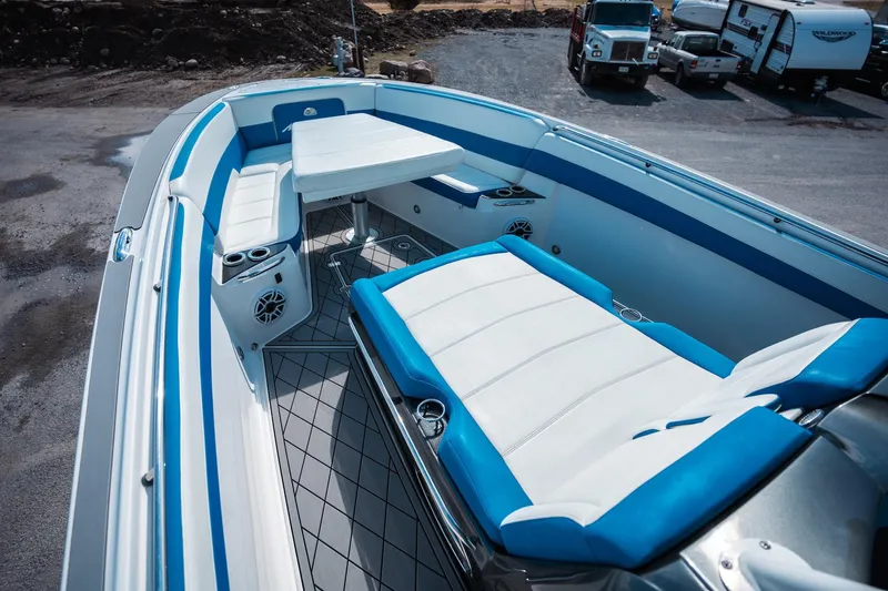 Yacht Photos Pics 2017 Nor-Tech 390 Sport Center Console boat interior with blue and white seating.