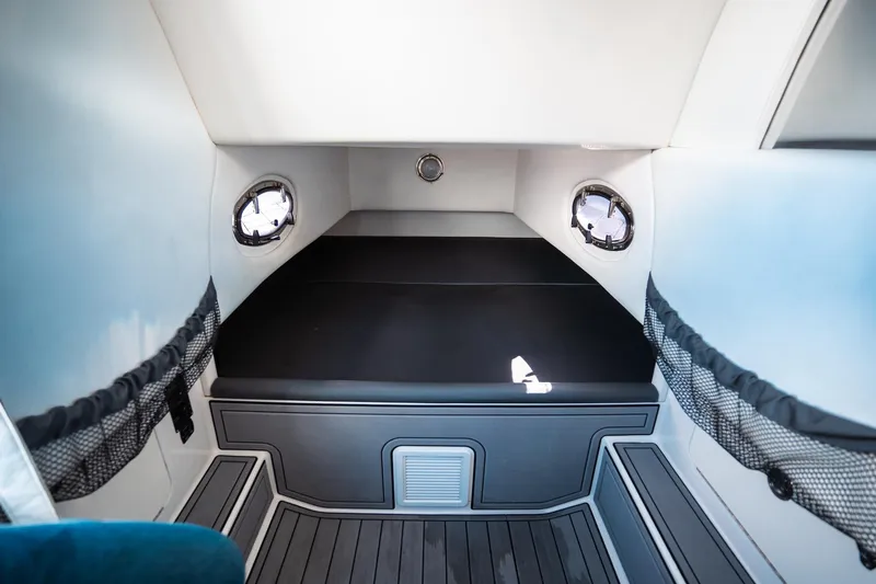  Yacht Photos Pics 2017 Nor-Tech 390 Sport Center Console cabin interior with sleek design and comfortable seating.