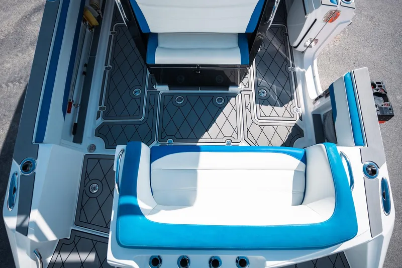  Yacht Photos Pics 2017 Nor-Tech 390 Sport Center Console interior with blue and white seating.