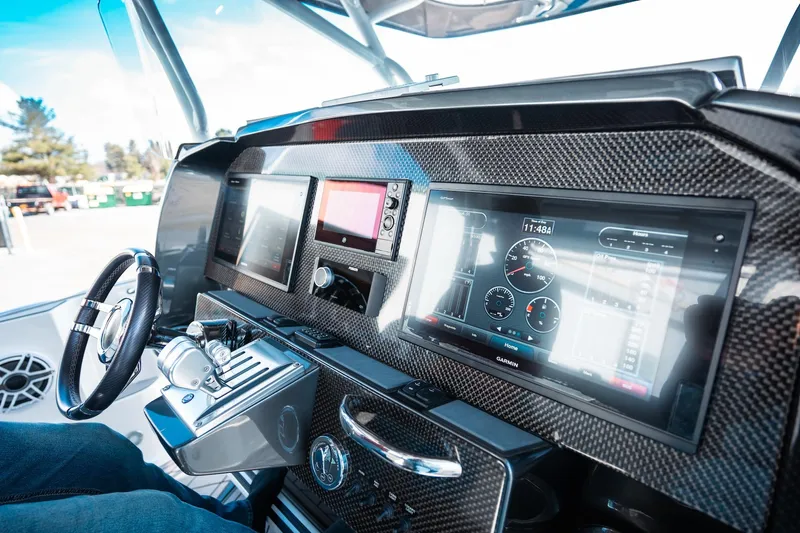  Yacht Photos Pics 2017 Nor-Tech 390 Sport Center Console dashboard with advanced navigation displays.