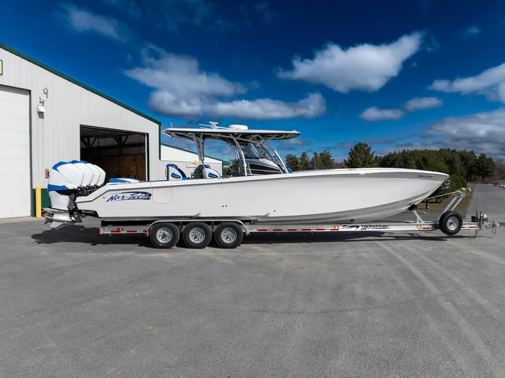  Yacht Photos Pics 2017 Nor-Tech 390 Sport Center Console boat on trailer, parked outdoors.
