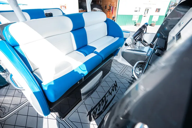  Yacht Photos Pics 2017 Nor-Tech 390 Sport Center Console with blue and white seating, modern interior design.