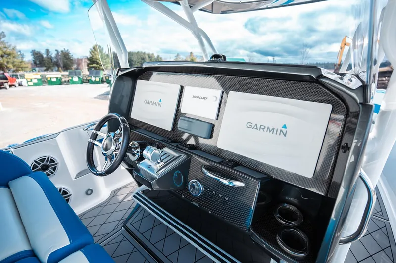  Yacht Photos Pics 2017 Nor-Tech 390 Sport Center Console with Garmin navigation displays.