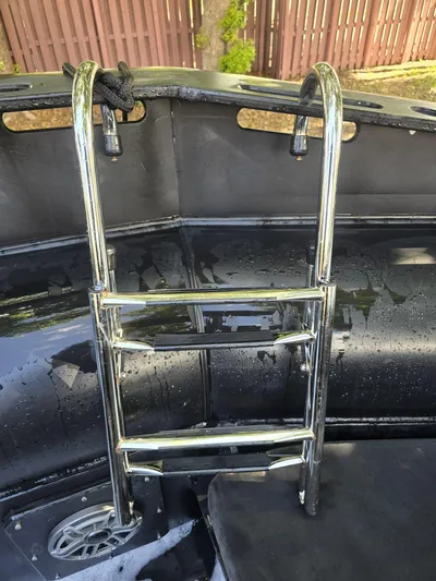 Dgs777 Yacht Photos Pics Chrome ladder on a DGS 777 Military Version boat, 2022 model, with wet surfaces.