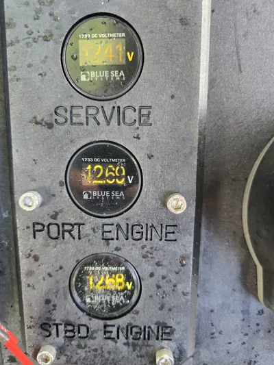 Dgs777 Yacht Photos Pics Voltmeter panel showing service, port, and starboard engine readings on DGS 777 Military Version.