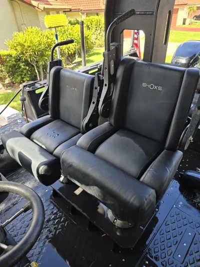 Dgs777 Yacht Photos Pics Two black SHOCKS seats in a 2022 DGS 777 Military Version vehicle.