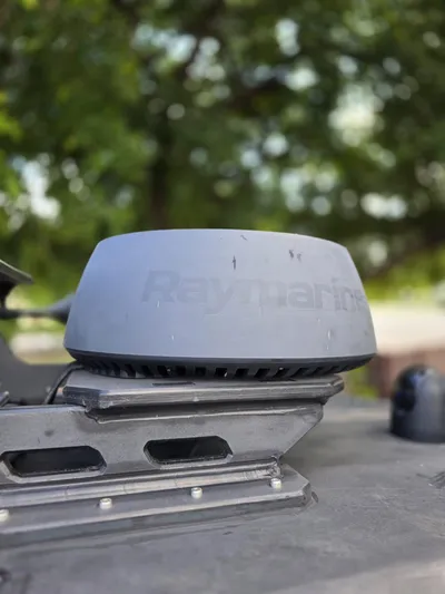 Dgs777 Yacht Photos Pics Raymarine radar on DGS 777 Military Version, 2022, with blurred green background.