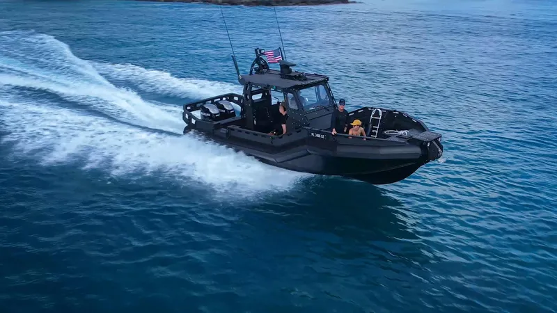 Dgs777 Yacht Photos Pics High-speed DGS 777 Military Version boat cruising on open water, 2022 model.