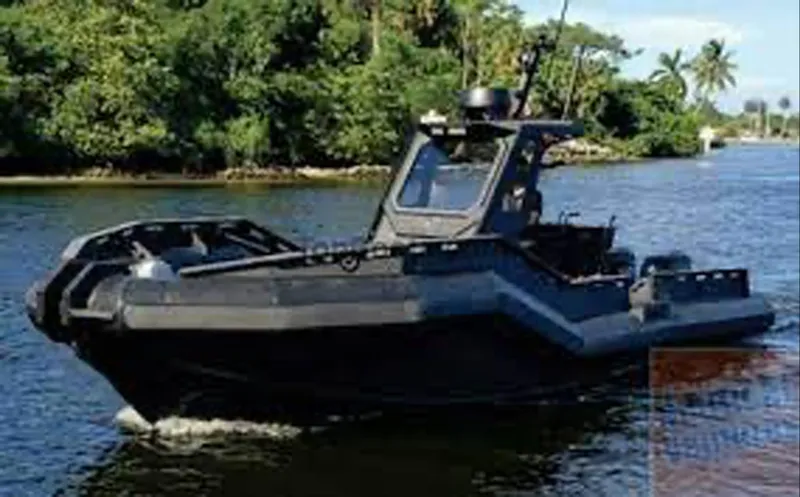 Dgs777 Yacht Photos Pics Military boat DGS 777 navigating a river, surrounded by lush greenery, 2022 model.