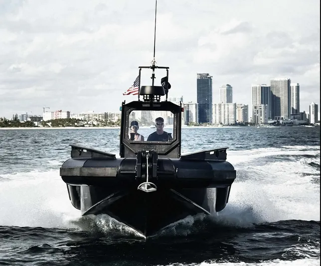 Dgs777 Yacht Photos Pics DGS 777 Military Version boat cruising near city skyline, 2022 model.