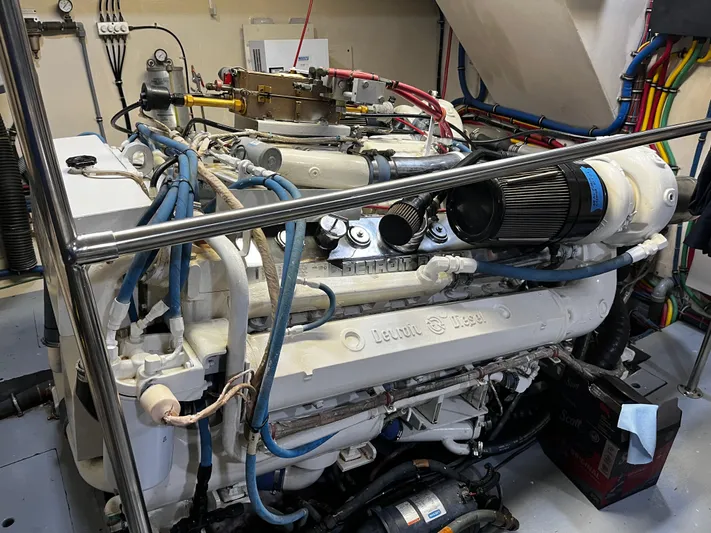 Reflections Yacht Photos Pics Engine room of a 1993 Hatteras 60 ED yacht with Detroit Diesel engine.