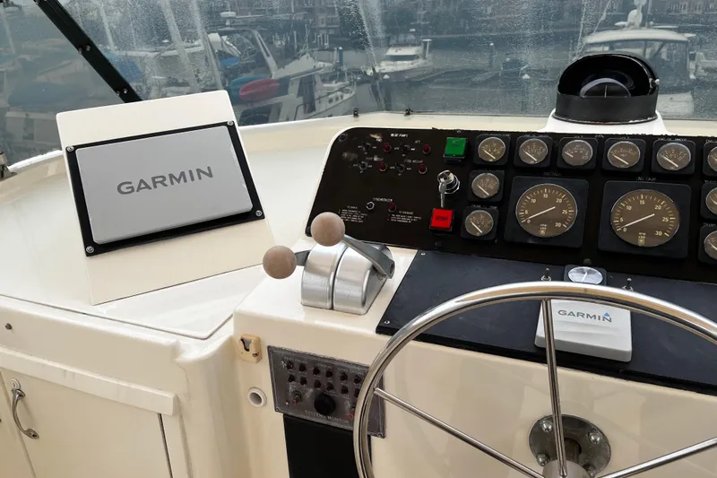 Reflections Yacht Photos Pics Control panel of a 1993 Hatteras 60 ED yacht with Garmin navigation system.