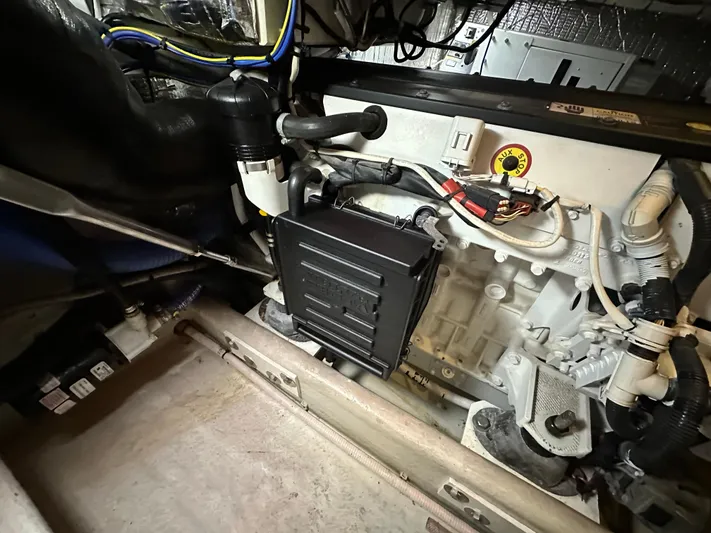  Yacht Photos Pics Engine compartment of a 2007 Nordic Tug 32, showcasing mechanical components and wiring.