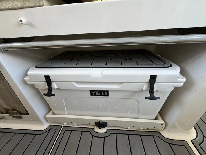 Mullin' It Over Again Yacht Photos Pics YETI cooler stored in a 2019 Regal 33 SAV boat compartment.