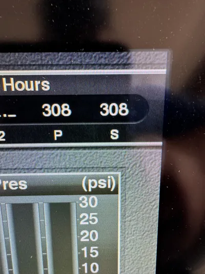 Mullin' It Over Again Yacht Photos Pics Display screen showing engine hours and pressure readings on a 2019 Regal 33 SAV boat.