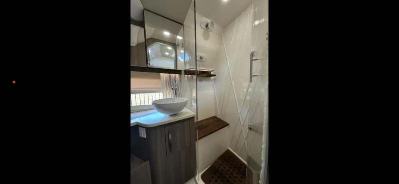 Mullin' It Over Again Yacht Photos Pics Modern bathroom in 2019 Regal 33 SAV boat with vessel sink and shower.