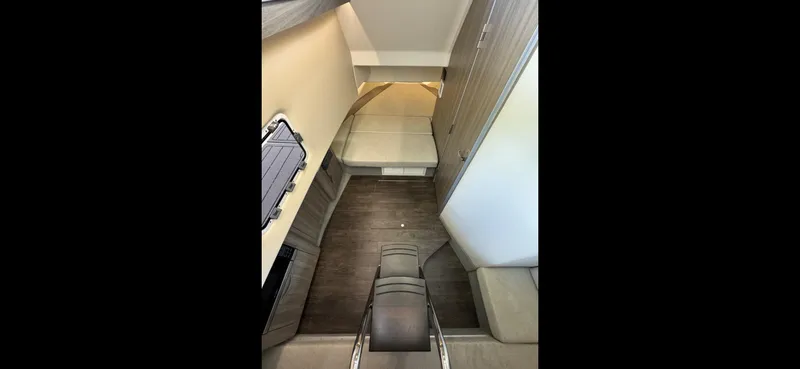 Mullin' It Over Again Yacht Photos Pics 2019 Regal 33 SAV cabin interior with modern design and comfortable seating.