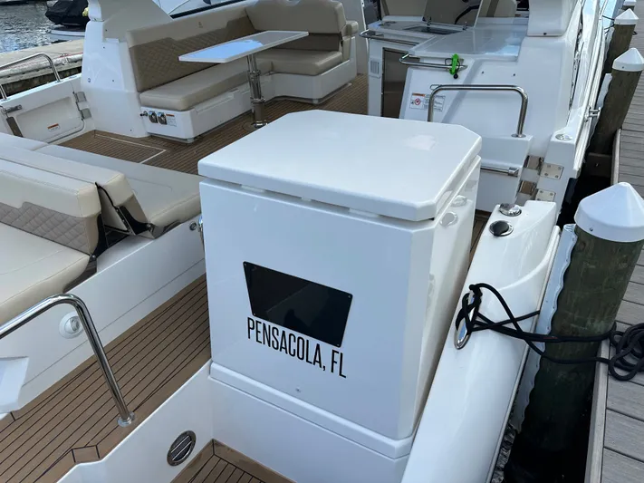  Yacht Photos Pics 2025 Aquila 36 Sport yacht interior with seating, docked in Pensacola, FL.