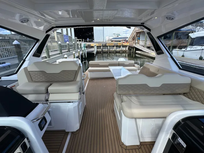  Yacht Photos Pics Luxurious interior of 2025 Aquila 36 Sport yacht with elegant seating and modern design.