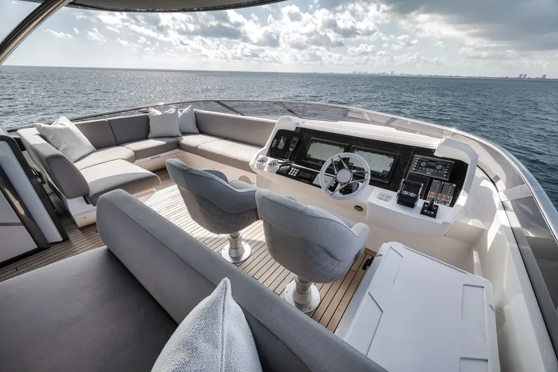 Dolce Far Niente Yacht Photos Pics Luxurious cockpit of the 2026 Sunseeker 88 Yacht on open sea.