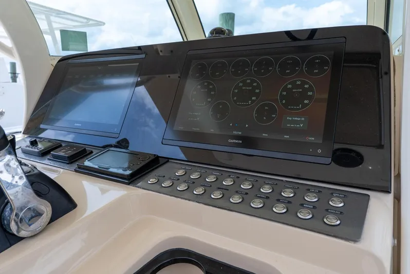 Innisfree Yacht Photos Pics 2015 Scout 300 LXF boat dashboard with modern navigation displays and controls.
