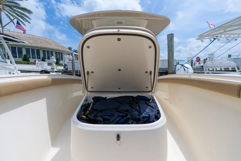 Innisfree Yacht Photos Pics 2015 Scout 300 LXF boat storage compartment open at dockside.