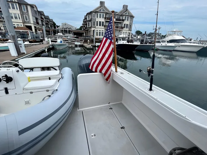 Veritas Yacht Photos Pics Wesmac 42 boat docked at marina, American flag, 2016 model.