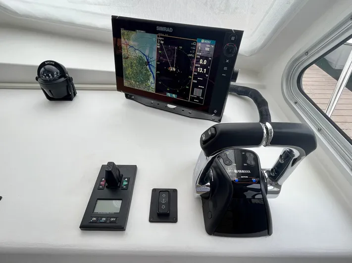 Veritas Yacht Photos Pics Wesmac 42 helm with Simrad display and Yamaha controls, 2016 model.