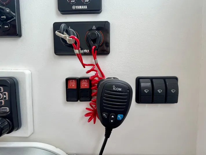 Veritas Yacht Photos Pics Boat control panel with Icom radio and Yamaha switches, Wesmac 42, 2016 model.