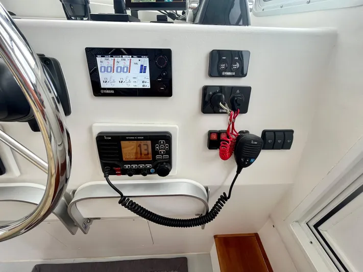 Veritas Yacht Photos Pics Control panel of a 2016 Wesmac 42 boat with navigation and communication equipment.