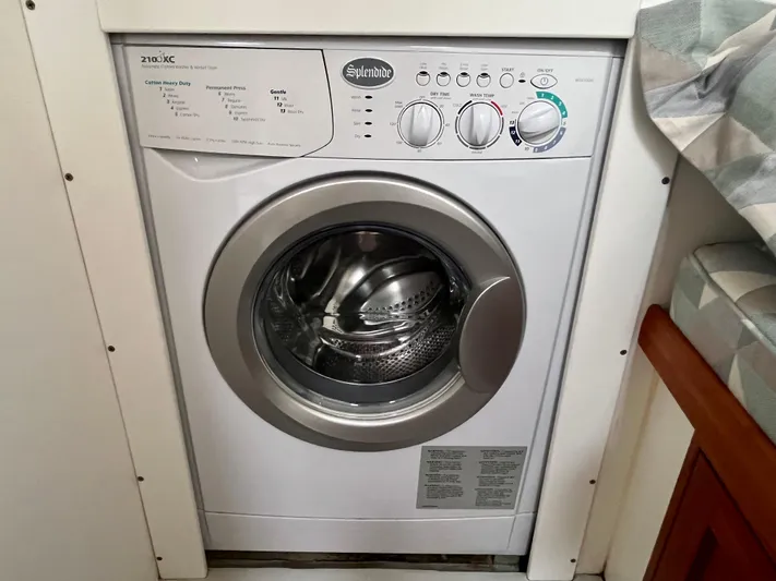 Veritas Yacht Photos Pics Splendide washing machine in a Wesmac 42, 2016 model, compact laundry area.