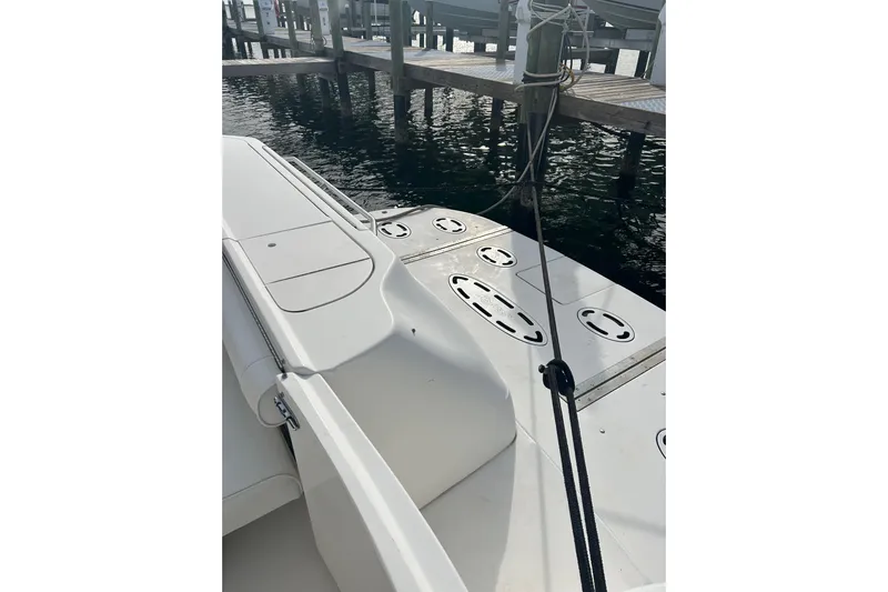  Yacht Photos Pics 2001 Sea Ray 480 Sedan Bridge yacht docked at marina, showing deck and mooring lines.