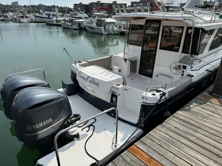  Yacht Photos Pics 2021 Cutwater C-32 C boat docked with twin Yamaha outboard engines.