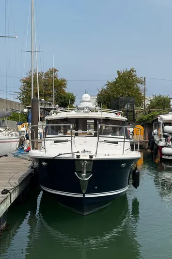  Yacht Photos Pics 2021 Cutwater C-32 C boat docked in a marina, front view.