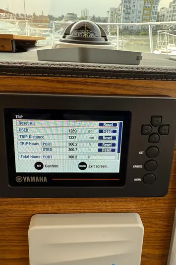  Yacht Photos Pics Yamaha trip monitor on 2021 Cutwater C-32 C boat, displaying fuel and distance data.