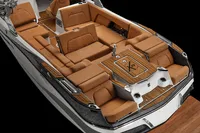 Manufacturer Provided Image: 2020 MasterCraft X26 boat interior with luxurious tan seating and teak accents.
